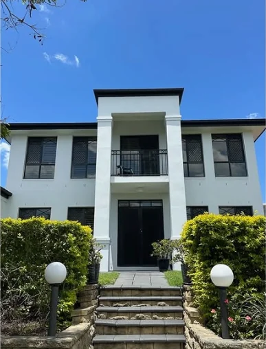 East Coast Paintworks project: white and charcoal exterior after repainting